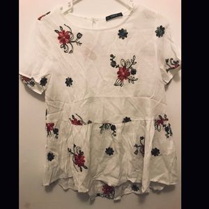 Embroidered peplum top